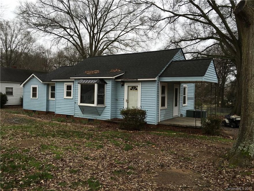 This is a cute bungalow waiting on some one to come in and remodel. It is in a very quite, settled neighborhood. It sits on a double size lot that includes big shade trees and plenty of room to run. You might want to go for a peaceful walk or just enjoy the shade trees. Owner is motivated. House has been primed with white inside and waiting for your colors!