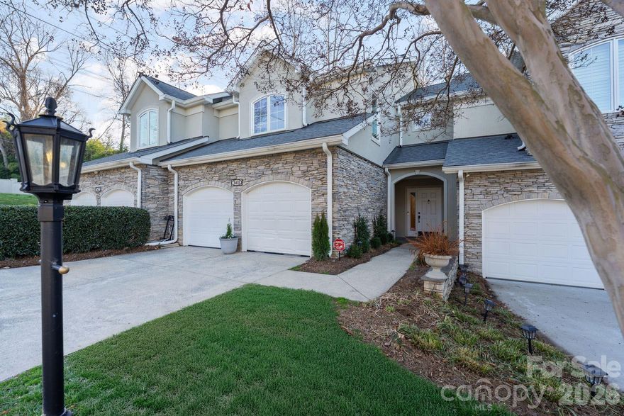 Perfectly positioned in the heart of SouthPark, this extensively renovated townhome offers refined living in one of Charlotte’s most desirable districts. Tucked within a quiet, tranquil community yet moments from everything, the home pairs an exceptional setting with meticulous, top-to-bottom upgrades, most notably fully gutted and reimagined bathrooms designed with custom, contemporary finishes.

A covered entry opens to a dramatic two-story foyer anchored by a new designer chandelier and custom-built table. New flooring extends throughout the home, complemented by a comprehensive interior repaint, upgraded designer lighting, and elevated finishes selected in collaboration with a professional interior design team.

The main level is thoughtfully designed for both everyday living and entertaining. The spacious living room features two distinct sitting areas, a tray ceiling, a gas fireplace with built-in cabinetry and display shelving, and an integrated bar with a wet sink and floating shelves. The chef’s kitchen showcases premium appliances, along with a custom backsplash and an expanded walk-in pantry with an integrated wine refrigerator. The redesigned powder room features a custom vanity and Phillip Jeffries wallpaper.

Upstairs, the primary suite offers tray ceilings, dual custom closets, and a spa-inspired bath with marble flooring, marble countertops, gold hardware, soaking tub, expanded shower, and private water closet. Two spacious guest bedrooms provide extensive closet space with custom systems and share a fully renovated Jack-and-Jill bathroom featuring dual vanities and elevated tile surrounds. A stunning laundry room with marble floors, custom cabinetry, and Gucci wallpaper completes the upper level.

The outdoor living space is a true extension of the home, thoughtfully redesigned for low-maintenance enjoyment. A custom paver terrace creates the perfect setting for al fresco dining and entertaining beneath the pergola, while the integrated fire feature anchors the space for year-round gatherings. Professionally installed turf ensures a lush, manicured appearance without upkeep, complemented by curated landscaping, integrated lighting, and irrigation drip lines for effortless maintenance. A stucco privacy enhances both seclusion and style, transforming the backyard into a private SouthPark retreat.

This exceptional location offers walkable access to premier SouthPark dining and retail, everyday conveniences, and vibrant community amenities. Enjoy close proximity to Park Road Park and miles of trails along the Little Sugar Creek Greenway, as well as easy access to major corridors, including Park Road, I-77, and I-485 for seamless connectivity to Uptown, SouthEnd, and Charlotte Douglas International Airport. The home is also ideally positioned near some of Charlotte’s top-rated public and private schools, further elevating its long-term value and lifestyle appeal.