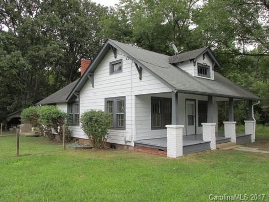 Available 12/15/17: Located on a large, private lot, this 3 Bed / 1 Bath, 1940's bungalow is perfect for someone who wants country living &  privacy. Home features 1000sf of living space, combination of wood & laminate flooring, Kitchen furnished w/ a range & refrigerator (no dishwasher). Features include central heat & air, a wood stove & laundry room. Even though this home is in the country the property is exactly 10 miles from I-485, giving you easy access into Charlotte. Pets Conditional
