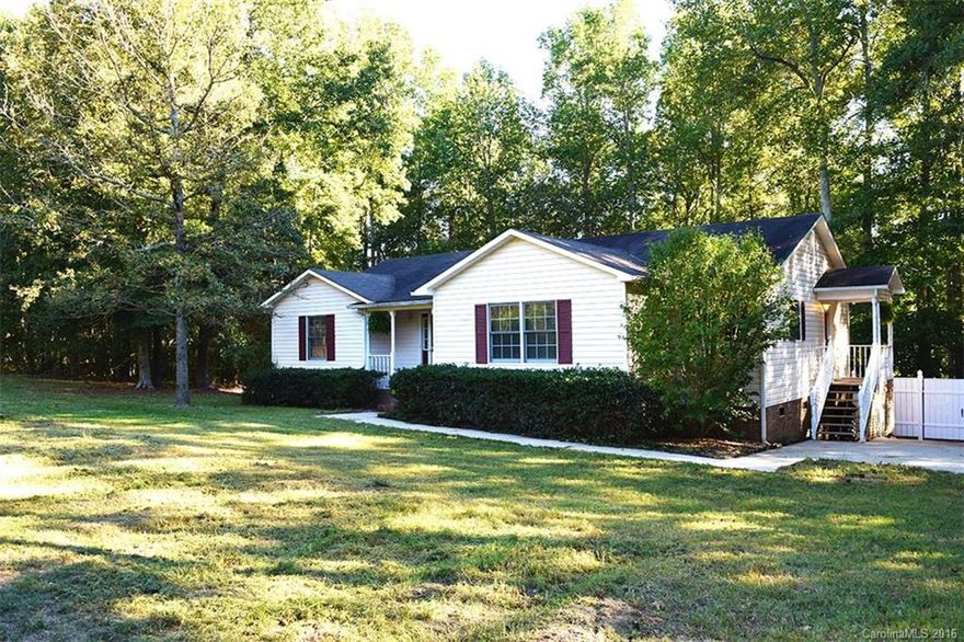 USDA Eligible! Lovely ranch with split floor plan. Great room with vaulted ceiling. Master bedroom has his/hers closets and sinks, as well as a garden tub. Wonderfully quiet and peaceful surroundings with an oversized private back deck; all the benefits of country living with easy access to the amenities of town (just minutes from I-77). The backyard has a terraced garden prepared for planting, and a shop wired and plumbed with a utility sink. All appliances stay. Big pantry. Move in ready!
