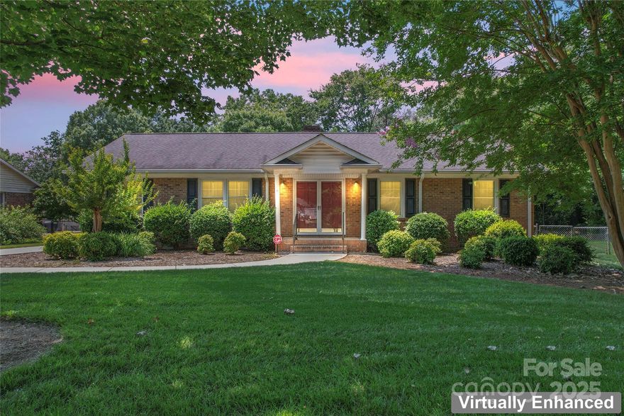 Charming all-brick ranch on a quiet cul-de-sac in a prime Charlotte location! With a large, level, professionally landscaped yard and fenced backyard, this home offers outdoor space that’s perfect for entertaining, pets, or play. An oversized detached 2-car garage/workshop is ideal for hobbies, storage, or future creative use. Inside, you’ll find a classic floor plan with hardwoods throughout most of the home, plus a bright and inviting sunroom overlooking the backyard. The updated HVAC system and solar panels adds comfort and peace of mind. Move in now and update at your own pace—this timeless home is ready for your personal touch. A rare opportunity to own a solid, stylish home with huge potential!