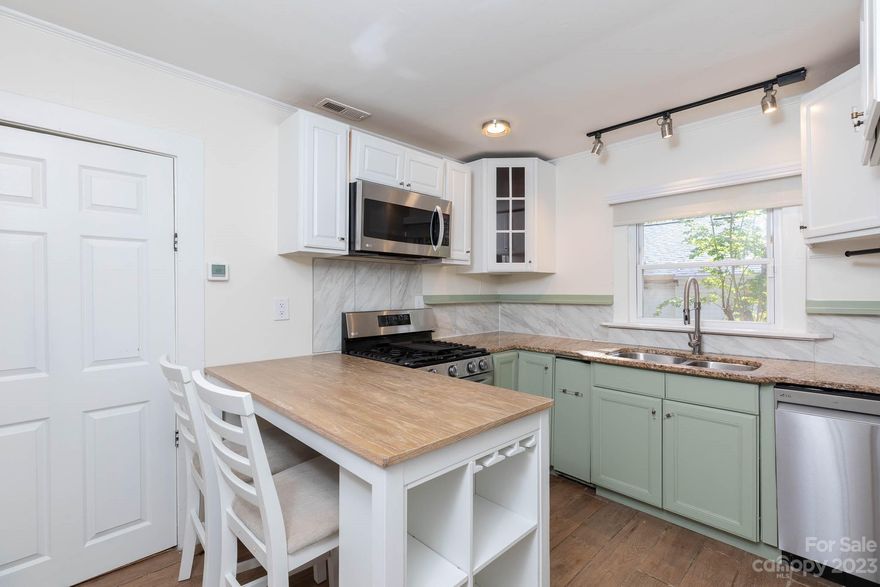 Cozy Cottage! Spacious Yard! Upgrades!  This charming and cozy home has  so many updates you will love...such as newer roof, hvac, appliances and more!  This home has lots of natural light,  an eat in kitchen and has a fabulous back yard with shade and fruit trees.  All  located just minutes from downtown Rock Hill and interstate!