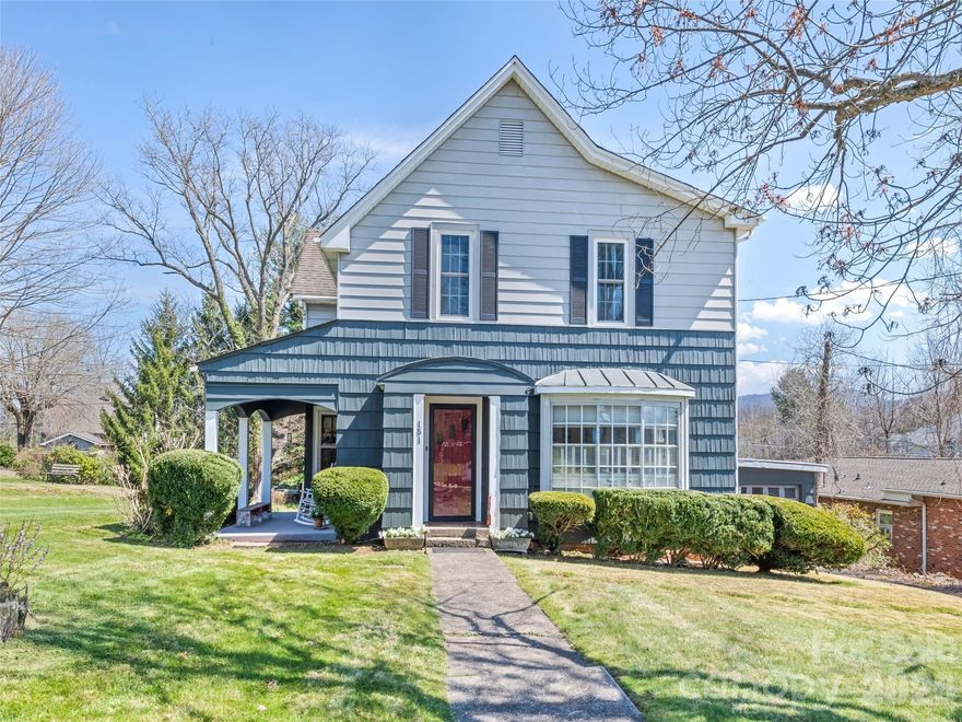 Step into timeless charm with this beautifully preserved 1948 historic home in the heart of Canton, North Carolina. Featuring classic architecture and spacious, light-filled rooms, this four-bedroom, two-bath residence blends vintage character with everyday functionality. Enjoy warm pine flooring, a formal dining room perfect for gatherings, and a convenient primary bedroom on the main level. Generous closet space throughout adds to the home’s livability. Located within walking distance to downtown Canton, you’ll love the easy access to local shops, dining, and community life. The basement offers unique flexibility, including a vintage bomb shelter and the potential to create a separate apartment space (pending town approval). The property also offers the potential to divide the lot for an additional residence with frontage on Halyburton Street (subject to town approval). This one-of-a-kind property is full of charm, history, and opportunity—ready to welcome its next chapter.