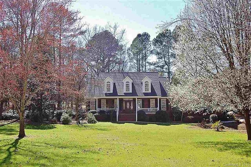 Golf course views...on OVER an acre...and no HOA's?  Heaven on earth exists in this gorgeous all-brick home on the 17th hole. Brazilian cherry hardwood floors, updated kitchen w/stainless steel appliances, big bonus room upstairs. Sunroom can convert to a screened porch, deck overlooks the green grass of Lancaster Golf Course, and enjoy the warm glow of the firepit under the stars. A show-stopping yard in the spring!