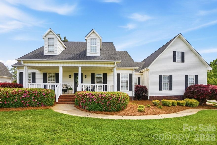 Welcome to this beautifully maintained ranch home, perfectly positioned on a spacious corner lot in the highly sought-after Cox Mill High School district. Thoughtfully designed with both comfort and functionality in mind, this home offers effortless one-level living with the added flexibility of a bonus room above.

Inside, you’ll find a bright, open layout featuring hardwood floors throughout the main living areas and no carpet anywhere in the home. Vaulted ceilings create an airy feel, while the dedicated study, formal dining room, and inviting breakfast area provide the perfect balance of everyday living and entertaining space. The kitchen features solid maple cabinetry, granite countertops, and added under-cabinet lighting for a warm, modern touch. Even better, the kitchen refrigerator conveys along with the washer, dryer and an additional refrigerator in the garage - making your move-in that much easier.

The spacious primary en-suite bathroom has been beautifully updated with quartz countertops, new cabinetry, LVP flooring, a custom walk-in shower, barn doors, and a thoughtfully designed closet featuring custom shelving. Additional upgrades include all-new interior outlets and switches (2024), new window blinds throughout, and durable LVP flooring in select areas including the stairs and bonus room.

Step outside and enjoy your own private retreat—complete with a large Trex deck, paver patio with fire pit, fenced yard, and irrigation system—perfect for relaxing evenings or hosting gatherings. Car enthusiasts, hobbyists, or those needing extra space will love the oversized attached garage plus a detached two-car garage with a finished room above, ideal for a home gym, office, or guest space. 

Additional highlights include a new roof (2025), new hot water heater (2026), encapsulated crawlspace, floored attic storage, and extended concrete for extra parking.

This home truly checks every box—style, space, and smart upgrades—all in a prime location. Don’t miss your opportunity to make it yours!

Agent is owner/seller.