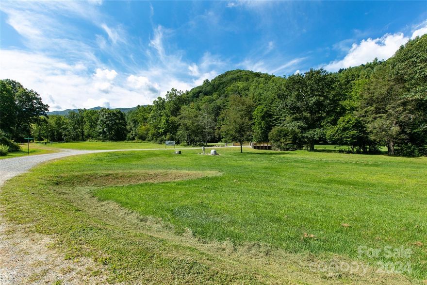 Ready to Build Your Mountain Retreat by the River? Discover a well-maintained and near-level community—a rare gem in the mountains! Immerse yourself in the soothing sounds of water cascading over river rocks, set against the breathtaking backdrop of the national forest and Camp Daniel Boone. Enjoy convenient access to the Blue Ridge Parkway, renowned trout waters perfect for fly fishing, and the locally beloved Sunburst Trout Farm. Whether you're seeking tranquility or adventure, this location offers the best of both worlds.