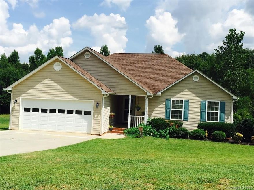 Adorable home in a quiet country setting featuring a large backyard with deck with natural gas hookup for grill and a two-car garage. Home boasts an open floor plan with 3 bedrooms and 2 full baths with a gas fireplace and vaulted ceiling in living room and trey ceiling and walk-in closet in master bedroom.  New carpet and fresh paint throughout.  Move in ready.  Conveniently located within minutes of I-77, shopping, dining and entertainment.