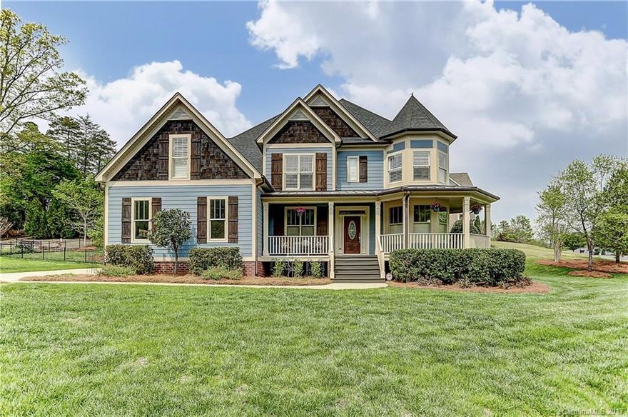 The Landing...Lake Living. Victorian 2 Story Home w/ wrap around porch, fenced in yard over .5 acres w/ mature landscaping, 2.5 car garage, outdoor living area. Open floorplan, Hardwoods & Decorative molding, Guest suite on main, Study w/ french doors, Formal dining, Soaring ceilings, Plantation Shutters, Wall of windows in the Greatroom w/ custom remote blinds, Gourmet Kitchen, Granite, Breakfast area, Scenic views, Mastersuite w/ trey, inlay lights, walkin closet, Spacious Secondary bdrms.