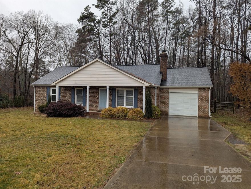 Fully remodeled in 2019 - new kitchen and baths, new deck, new appliances, new EVERYTHING.  This 3 bedroom two bath home sits on a quiet cul-de-sac.  There is a fenced rear yard and then woods behind the fenced area with a stream.  It's very private and beautiful!  The interior features granite kitchen countertops, lots of storage in the kitchen, an open floor plan new tile/tubs/toilets/sinks in all baths.  Freshly painted ceilings and walls and laminate hardwood throughout living areas.  1 car garage with garage door opener and access to rear yard.  Nice location - private but easy access to freeways and shopping. Home will be ready for occupancy March 1st.