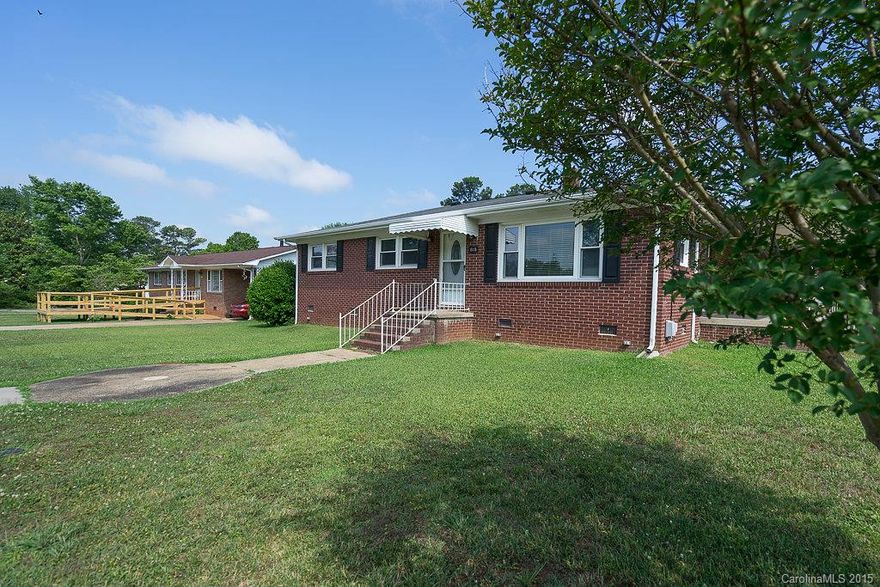 Priced below tax value! Super cute, comfortable and very clean. Conveniently located brick ranch on corner lot with a fenced in back yard.  Wonderfully taken care of.  Nice sized bedrooms.  Newer carpet and neutral paint throughout. The roof was replaced in 2012 and the gas pack was replaced in 2013.  Hardwood floors under the carpet.