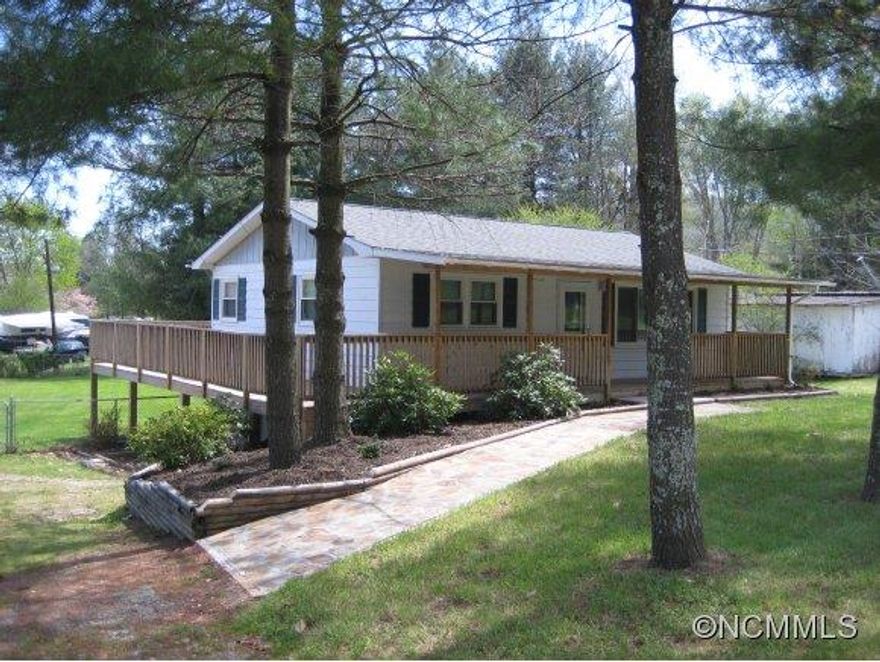 Come see this charming, well maintained ranch style home. This home offers hardwoods throughout and tile in bath and kitchen. The exterior has a huge wrap around deck with a screened area, as well as a fully fenced rear yard, all for your outdoor enjoyment. The heated unfinished basement, has a new basement dry system with a transferable warranty and the home has easy access to I-26. Own for less than rent!!!!