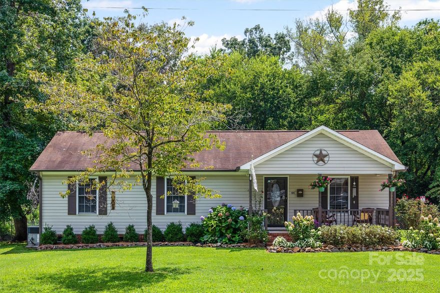 This 3-bedroom, 2-bath ranch on nearly half an acre is just minutes from downtown York and filled with welcoming updates. The open floor plan features upgraded flooring throughout and modern bathroom vanities, creating a fresh and comfortable interior. A covered rocking chair front porch is perfect for relaxing mornings, while the back deck overlooks a spacious, level yard ideal for gatherings or play. With blooming perennials adding curb appeal and a convenient location close to shopping, dining, and schools, this home is ready to enjoy inside and out.