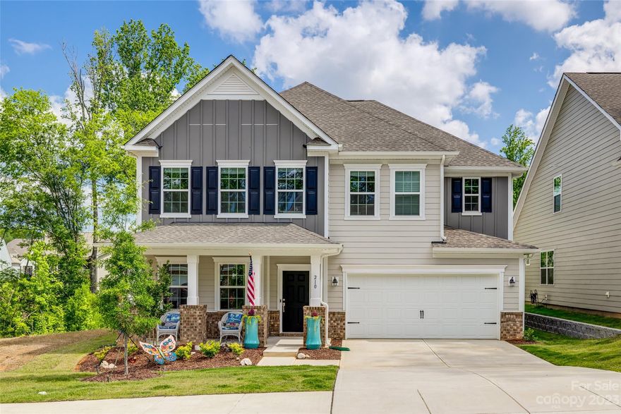 Sellers are motivated.  Beautiful almost new 4 bedroom 3 1/2 bath home in the desirable Windhaven Community.  The features of this stunning home include a large kitchen with white cabinets topped with crown molding, quartz countertops, stainless steel appliances with gas range, LVP in main living areas, family room with gas fireplace and built-in shelving and screened in porch. The Second floor features the primary suite with dual closets, stand up shower, quartz countertops with dual sinks and a view of the tree lined greenspace. In addition to the Primary Suite, the Second floor features 3 oversized bedrooms, 2 full bathrooms, separate laundry room and a bonus room.  Property's back and side yard are both connected to green space currently owned by the HOA.  Home is still covered by Lennars Limited 2-10 Warranty.