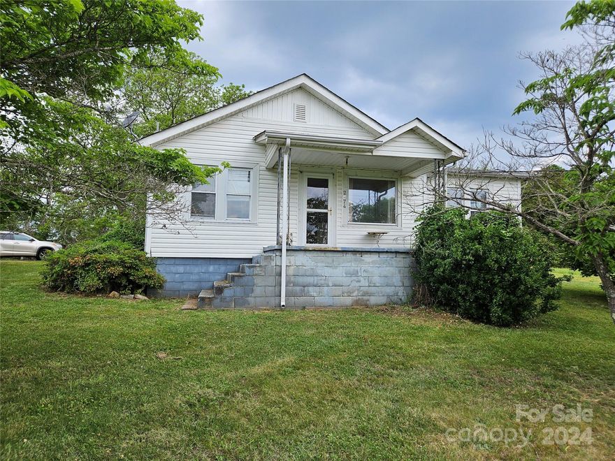 2474 Messer Rd Valdese, NC Attention Cash buyers, investors or home renovators.  Motivated seller: This property offers 3 bedrooms, 1 full bathroom, and a 1/4 bath with a shower, on 3 parcels totaling 1.05 acres. The house features a living room, family room, kitchen, and dining area, along with a welcoming front porch and covered rear patio. While in need of restoration, fresh paint, updated light fixtures, and refinishing the hardwood floors could revive this home to its former charm. The property is serviced by Valdese public water and has a septic tank. This home has an approximately 2009 architectural shingle roof and a 2015, 9-year-old heat pump. The basement is a cellar-style with a partial dirt and gravel floor and an outside entrance.  The stand up shower as never been hooked up to plumbing.  Given its current condition, cash and quick closing preferred. Reduced $145,000!