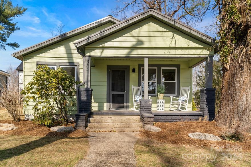 Another amazing whole home renovation by Zen Contracting! This home has so many new features packed into a functional and economical floor plan. Walk into a bright and open floorplan with vaulted ceilings and tons of natural lighting splashing in through all the windows in the main living area. Newly refinished hardwood floors in the living areas and bedrooms matches nicely with the new LVP tile in both bathrooms and kitchen. All new custom kitchen with dark stone countertops matches perfectly with the tile backsplash and stainless appliance package. Both bedrooms have vaulted ceilings and the primary features a spacious full bath with tiled in surround. The upgrades keep coming with new central HVAC, Recessed led lighting throughout, fully encapsulated crawlspace, new metal roof and fresh paint inside and out. This turn key bungalow is only 5 mins to downtown Asheville, Haywood road, New Belgium Brewing and so much more. heck out the Matterport virtual tour and video!