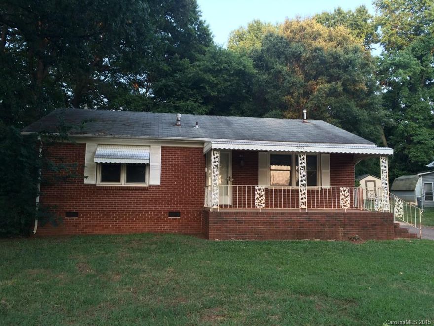 JUST REDUCED Fannie Mae HomePath property with full brick exterior and detached carport/workshop. Large .31 acre lot near Uptown and the airport with good rental history. Original hardwood flooring, knotty pine Den/ 3rd bedroom and front porch.  Exempt from disclosures.