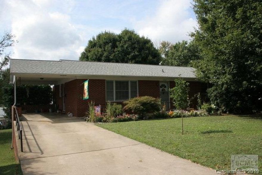 Nice brick ranch in Morganton. Home, with over 1275 square feet, features living room, kitchen/dining area, three bedrooms, 1.5 baths, and single carport. The lower walkout level is heated and cooled and has a tile floor with unfinished ceiling. Lower level has a second kitchen, family room area, game room area, and two rooms that could be used for office or sleeping area. Situated on a 0.25 acre lot with nice landscaping, back patio, and large backyard with outbuilding. Over 2500 square feet of heated/cooled space. A nice home.