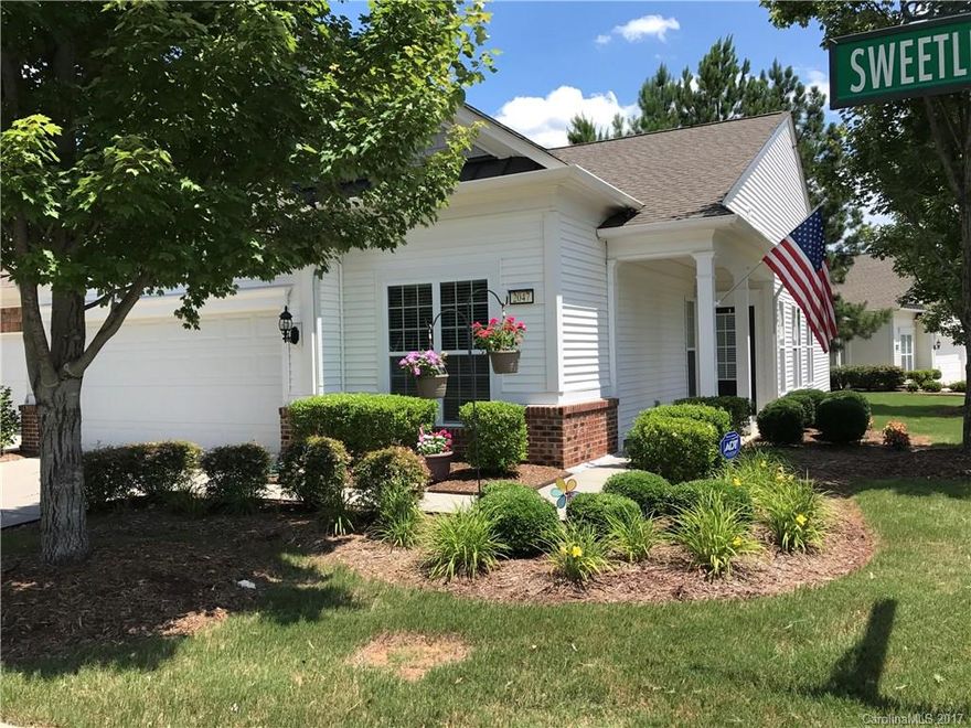 Popular Muirfield model--largest Villa floorpan. Walking distance to restaurants, shopping, groceries, and more! Foyer leads to spacious, bright Great Room, hardwoods in the Kitchen, Dining Area, Office, & Great Room. Gourmet Kitchen w/gas stove, stainless appliances, ceramic tile back splash, breakfast bar, & pantry. Master BR w/double sinks, walk-in closet, stall shower, ceramic tile. 3-season porch w/ceramic tile, vinyl porch windows by Express Sunroom, patio with privacy fence & landscaping.