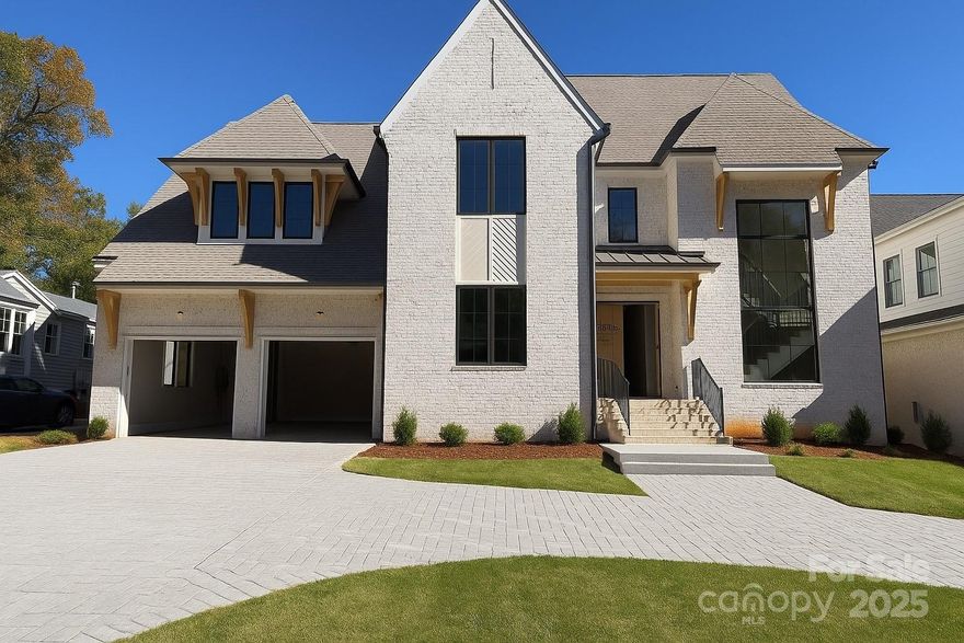 If you are looking for a walk out BASEMENT, an ELEVATOR & a PRIMARY SUITE on the main level....allow me to introduce... 1519 Lynway Drive. 
This custom, three-story home that blends architectural artistry with everyday livability, complete with a finished walk-out basement and resort-style backyard.
From the moment you arrive, the home sets the tone with its reeded foyer detail and soaring three-story open staircase that floods the entry with natural light. The two-story foyer balances comfort and luxury, creating a striking first impression.
The main level primary suite is a private retreat featuring herringbone white oak details, a spa-inspired en-suite with reeded stained cabinetry, and a 10” curved marble countertop splash that elevates the design. A marble-tiled floor and custom closet with washer/dryer hookup complete the suite. A spacious guest suite with private bath (or optional home office) also sits on the main level for added flexibility.
The open living room is anchored by a cast stone wood-burning fireplace and a stunning wood-detailed ceiling. The chef’s kitchen pairs soft warm-white cabinetry with a contrasting stained wood island and integrated design details, while the fully equipped scullery offers a Bev/wine fridge, 1 of the 3 dishwashers, and ice maker. 
Accordion doors extend the living space outdoors to a screened deck with a gas grill and fireplace, perfect for entertaining, with steps leading down to the backyard.
The walk-out basement is designed for both relaxation and recreation—featuring a large gym, private guest suite with full bath, expansive entertaining room with second kitchenette, and a dedicated pool bath with dual access (interior and exterior). Outside, the home’s pool and hot tub oasis create the ultimate retreat, blending seamlessly with the indoor entertaining spaces.
Every detail at 1519 Lynway has been curated to offer a thoughtful balance of luxury, function, and lifestyle—a home as stunning as it is livable.