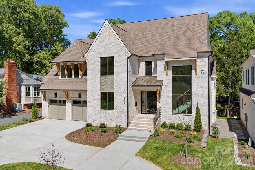 If you are looking for a walk out BASEMENT, an ELEVATOR & a PRIMARY SUITE on the main level....allow me to introduce... 1519 Lynway Drive. 
This custom, three-story home that blends architectural artistry with everyday livability, complete with a finished walk-out basement and resort-style backyard.
From the moment you arrive, the home sets the tone with its reeded foyer detail and soaring three-story open staircase that floods the entry with natural light. The two-story foyer balances comfort and luxury, creating a striking first impression.
The main level primary suite is a private retreat featuring herringbone white oak details, a spa-inspired en-suite with reeded stained cabinetry, and a 10” curved marble countertop splash that elevates the design. A marble-tiled floor and custom closet with washer/dryer hookup complete the suite. A spacious guest suite with private bath (or optional home office) also sits on the main level for added flexibility.
The open living room is anchored by a cast stone wood-burning fireplace and a stunning wood-detailed ceiling. The chef’s kitchen pairs soft warm-white cabinetry with a contrasting stained wood island and integrated design details, while the fully equipped scullery offers a Bev/wine fridge, 1 of the 3 dishwashers, and ice maker. 
Accordion doors extend the living space outdoors to a screened deck with a gas grill and fireplace, perfect for entertaining, with steps leading down to the backyard.
The walk-out basement is designed for both relaxation and recreation—featuring a large gym, private guest suite with full bath, expansive entertaining room with second kitchenette, and a dedicated pool bath with dual access (interior and exterior). Outside, the home’s pool and hot tub oasis create the ultimate retreat, blending seamlessly with the indoor entertaining spaces.
Every detail at 1519 Lynway has been curated to offer a thoughtful balance of luxury, function, and lifestyle—a home as stunning as it is livable.