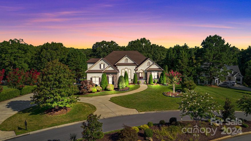 This luxurious 5-bedroom,3 1/2-bath is home nestled on a 1.1  acre lot with water views and private access to a serene community pond.This property has a sparkling pool,a soothing hot tub,and an outdoor kitchen equipped with stainless steel appliances w/gas grill,an inviting gas fireplace and a 50' screened porch.Inside,the finished basement is a true gem,offering a full kitchen,a comfortable bedroom,and a stylish full bath.It also boasts a unique safe room that doubles as a custom-built gun room..An entertainment area and an infrared sauna provides a luxurious touch.On the main level,tall,coffered ceilings in the dining area seamlessly flow into the spacious family room.The kitchen has beautifully painted cabinets,large work island,walk-in pantry and a cozy eat-in kitchen area perfect for casual dining.Updated fixtures and paint throughout enhances the home.The third level reveals a sizable bonus rm,offering versatile space and a walk-in cedar closet that provides ample storage space.