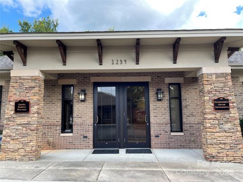 Photo of 1234 Mann Drive #200, Matthews, NC 28105 (MLS # 4259806)