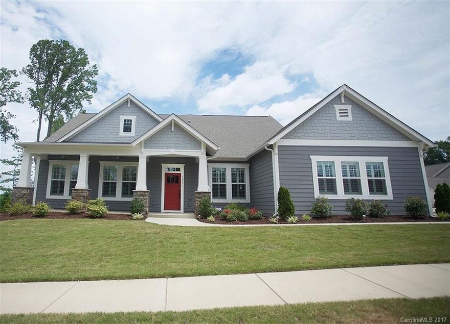 Gorgeous David Weekly built home w/ Fort Mill Schools! Great floorplan with master and guest suite down. open concept plan w/gourmet kitchen open to great room. Huge center island, gas cooktop white cabinetry & lrg pantry. 3 car garage w/ drop zone for bookbags as you enter the home. Formal dining and study w/ built ins. Upstairs features a huge playroom/bonus room and two large bedrooms both with their own baths. Great corner lot and fenced yard w/ covered patio. Comm pool w/slide & lazy river!