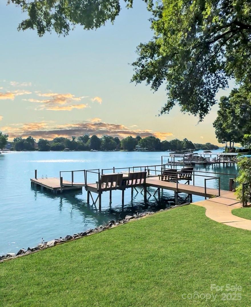 Nestled in the coveted Peninsula neighborhood overlooking beautiful Lake Norman, this beautiful basement home offers expansive sunrise views from almost every room throughout. Main level features include a sunny living area with open kitchen with breakfast area opening to the private outdoor terrace overlooking the lake. The Upper level features a bright primary suite with cozy fireplace, spa bath with soaking tub, walk-in closet, and private outdoor covered deck along with two additional bedrooms. The lower-level basement is complete with an updated full bathroom, gas fireplace, and covered patio. Shared dock with neighbor.