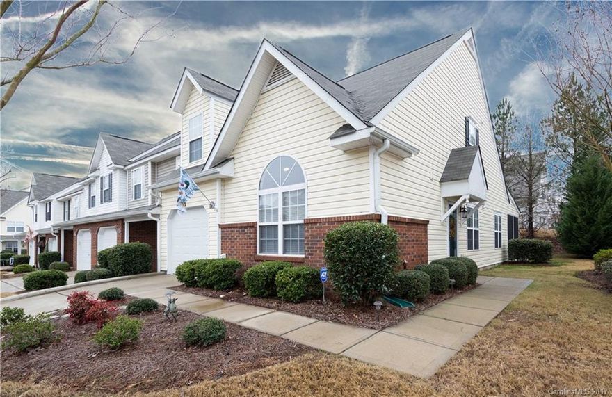 Wood floors, a screened porch, stainless steel appliances, fresh paint, vaulted ceilings, master on the main, and more - what more could you ask for? This end unit town home is located right off of 77, making any commute an easy one! Whether you are retiring and looking to downsize, buying your first home, or somewhere in between, this home is perfect for you! If you like it exactly how it is, you even have the option to make an additional offer on the furniture! As move in ready as they come!