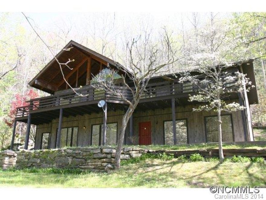 4 bedroom, 5 1/2 bath with 4040 sq ft on 22 acres! Ideal site for a B&B or family retreat near the State Park. This property has views, creek and massive rock outcroppings. A MUST SEE! PROPERTY REDUCED TO $350,000!