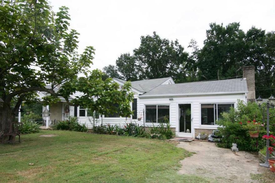 Beautiful home on 8 acres with a 20 X 20 sunroom, 3 bedrooms, 1 bath and 2 fireplaces.
