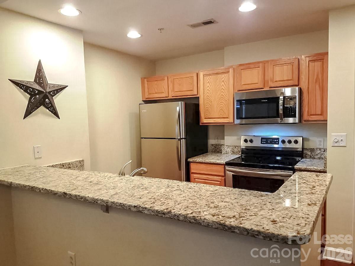 718 Trade Street 210