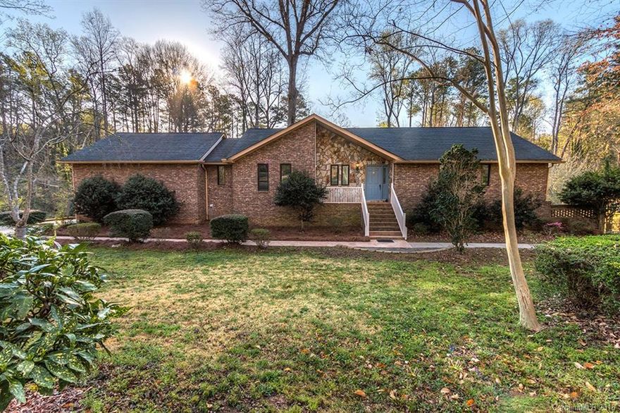 You will love this one!  Full brick ranch w/finished basement/"in-law" suite.  Two Master bedrooms!  Plus an awesome backyard oasis!!  Features incl:Main level Master plus 2 bedrooms & 2 bathrooms; living rm w/stone FP, formal dining, beautiful kitchen & laundry.  Basement includes Master suite w/walk-in closet, dressing area, double shower, double vanities, gorgeous tile flooring; kitchenette, family rm w/2nd FP, 5th bedroom w/4 closets.  Trex decking overlooking pool and backyard.