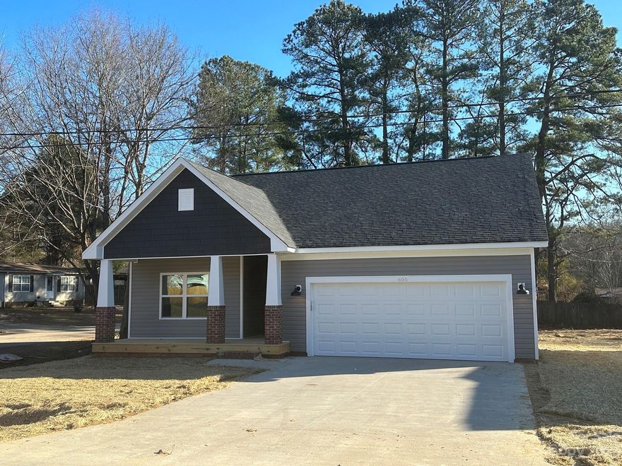 Must see this new construction, quality-built, craftsman-style home. Conveniently located in well-established neighborhood with no HOA and easy access to all that Kannapolis offers. Nice-sized 1/4 acre, corner lot. Lots of features inside this 3BR/2BA, 1,400+ sq ft home including: open floor plan; split-bedrooms; 9' ceilings; granite counters throughout; tile back splash; island w/ bar seating; stainless appliances including side-by-side refrigerator w/ ice/water dispenser; 42" cabinets and soft-close doors/ drawers; luxury vinyl plank floors; neutral/ pleasing colors throughout; owner's suite w/ tray-ceiling and large walk-in closet; primary bathroom w/ tiled floor and separate tub and tiled shower; dual vanities; guest bath w/ tub/shower combo; large utility room; attached, over-sized 2-car garage. Exterior boasts: raised brick foundation; covered front porch w/ decking; rear covered deck overlooking back yard; wide concrete driveway. Come make this your home today!