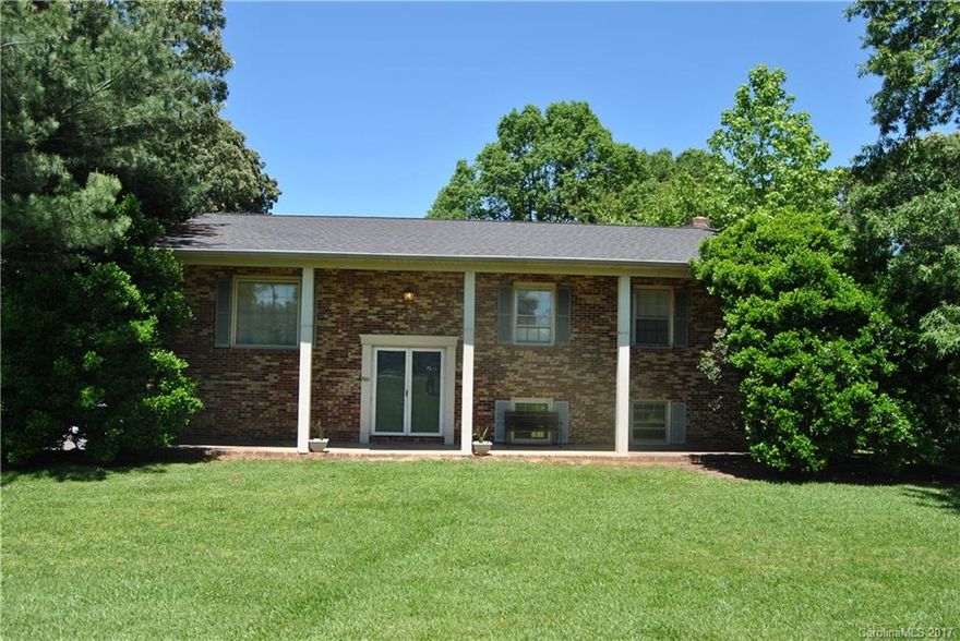 Wow - tons of finished square feet for the money.  With another 500sf of unfinished lower level space that could easily be finished.  Duct work already in place, just need to add a vent. Seller used lower level for pottery business - huge open room with real fireplace. Private backyd.  Storage bldg needs new siding but in good shape inside. Seller offering a $1500 carpet allowance with acceptable offer.  Priced $35k below market value because needs updates and minor repairs. Selling AS-Is.