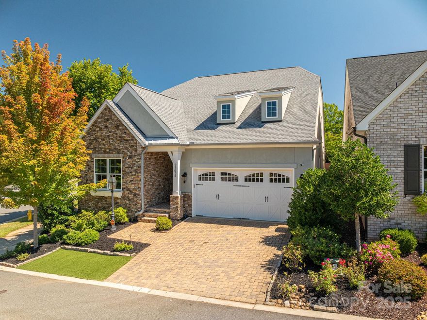 PRICE ADJUSTMENT!  Great opportunity to buy this stunning Classica 4-bedroom, 3.5-bath end unit residence, thoughtfully designed with elegant finishes, abundant upgrades, and a floor plan that blends comfort with sophistication. Built in true Classica style, this home offers both beauty and functionality for modern living.

The highlight of the property is the largest backyard with private outdoor living space — a true retreat featuring a cozy fireplace and a soothing waterfall, ideal for entertaining or simply unwinding at the end of the day.  Heated lanai also allows for year round use! The professionally designed yard includes low-maintenance artificial turf in both the front and back, ensuring year-round curb appeal and ease of care.

Inside, the main level offers convenience and style with 2 bedrooms, including a luxurious primary suite.  Upstairs you’ll find 2 additional bedrooms, a spacious bonus room, office  and walk-in storage — a rare find that adds both practicality and flexibility to the home.
Every detail reflects Classica’s reputation for thoughtful design and luxury upgrades, creating a home that is both elegant and livable.

Located in a PRIME CORNELIUS LOCATION, this property places you within walking distance of dining, shopping, grocery stores, medical offices, and the natural beauty of Jetton Park at Lake Norman. Whether you’re enjoying a peaceful morning walk along the lake, meeting friends for dinner, or relaxing in your own private oasis, this home provides the perfect balance of convenience and lifestyle.
Experience the best of Lake Norman living in this beautifully appointed Classica home.

Sellers have a Full Equity golf membership to The Peninsula Club.  They may consider selling the membership.
(Separate transaction) Buyers would have to go directly through Maureen Kindred at The Peninsula club and fill out an application to be approved.