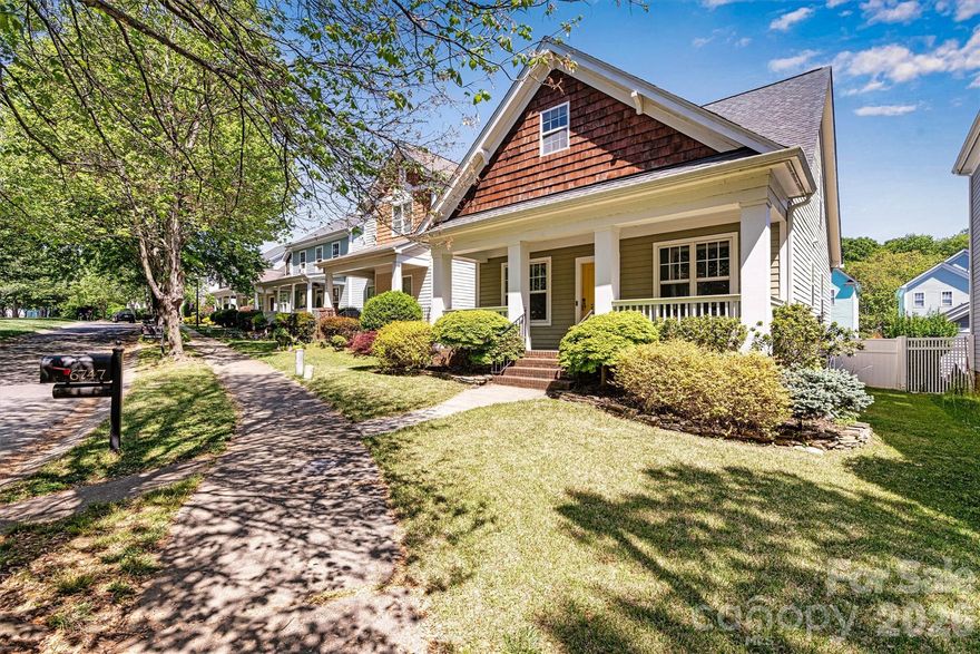An exceptional opportunity on a picturesque tree-lined street surrounded by open green space, this beautifully refined residence offers the perfect blend of timeless character and modern upgrades. This charming Craftsman-style home offers curb appeal with a welcoming covered front porch, classic white columns, and a warm, inviting color palette. The standout cedar shake gable adds character and architectural interest, while the cheerful yellow front door creates a bright focal point. 

Originally constructed in 2001, the home has been thoughtfully enhanced with a brand-new architectural roof (April 2026) and a meticulously maintained tankless water heater (2016). Big Bonus: Dual Fuel HVAC system. Energy-efficient heat pump for heating and A/C + gas heat when temps drop = comfort AND savings all year long. 

Newly refinished hardwood floors and a light-filled, open-concept design. The kitchen is appointed with quartz countertops, offering both style and functionality for everyday living and entertaining.

The expansive primary suite serves as a private retreat, complete with a generous walk-in closet and a spa-inspired en-suite bath featuring a double vanity. Outdoor living is equally impressive with a fully fenced yard ideal for relaxation or gatherings.

Additional highlights include ample attic storage and a home that has been carefully maintained with attention to detail throughout. Truly move-in ready. Location is always key, easily accessible to shopping, restaurants,  schools, hospitals, and Charlotte. Overall, it presents as a cozy, well-kept cottage with a blend of traditional charm and modern livability—ideal for buyers looking for character, warmth, and a move-in-ready feel.