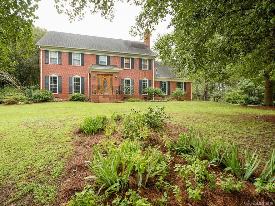 Great home on a private lot! Home is full of updates like new carpet on the 2nd floor, hardwoods rebuffed on 1st floor! Beautiful kitchen with granite counter tops & new tile! New tile in bathroom! Fresh paint throughout home! Home has fenced in back yard with desirable in ground pool w/ diving board! Pool has new liner & pump! Community park & playground! Low union county taxes! Close to Charlotte & easily accessible from highway!