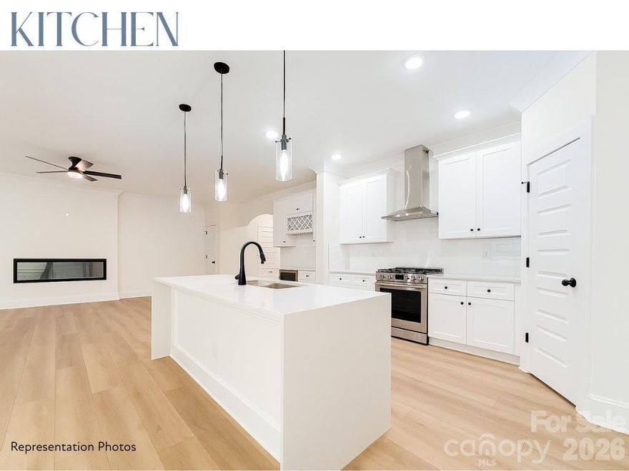 Welcome to Castleton Place. This is our Dunsmore plan, the largest plan in this community. 
Discover the rare opportunity to own a luxurious new-construction residence in one of Charlotte's most desirable areas and desirable schools. Surrounded by prestigious multi-million-dollar homes. Offering complete freedom with no HOA. Create your own private retreat in your backyard. Every detail has been curated with high-end living in mind: wide-plank flooring, designer black fixtures, Carrera waterfall countertops, and custom 42” cabinetry. The gourmet kitchen features a professional gas range, hood, microwave drawer, dishwasher, and beverage refrigerator designed for effortless entertaining. Unwind beside the 60” linear fireplace, relax in the light-filled sunroom, or retreat to a custom-designed walk-in closet. Crown molding, 5-panel doors, and smart-home integration elevate the everyday experience. Modern efficiency is built in with a tankless water heater and EV charger pre-wire. 16' of Privacy fencing is included. Situated minutes from Uptown Charlotte.   BIG Builder incentives available toward closing costs and rate buy-downs when using a preferred lender. Homes are under construction, photos are representation photos.