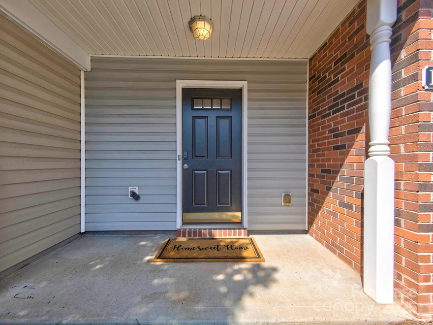 Beautiful 2-bed, 2.5-bath townhome situated in the Covington at Providence community. The main level showcases an open-concept layout with luxury vinyl plank flooring, half bathroom, kitchen featuring abundant cabinet space, a gracious dining area, and a comfortable living space with remote control gas fireplace. Step outside to discover a fenced patio area at the rear of the townhome, an idyllic setting for morning coffee or unwinding while entertaining friends after work. The upper level hosts a dedicated laundry area and 2 generously proportioned bedrooms with vaulted ceilings. The master is complete with a walk-in closet. Ideal location mere minutes from 485, Waverly, and the Providence Commons shopping center offering great convenience. Seeking a corporate rental? This residence perfectly blends upscale living with an unbeatable location. 6-month to 1 year lease allowed. Small pets allowed with a refundable deposit.