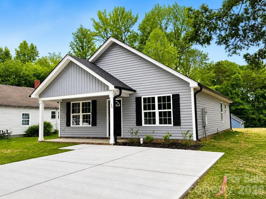 Welcome home to easy, modern living in this brand-new construction in Salisbury, NC. Thoughtfully designed with 1,181 square feet, this 3-bedroom, 2-bath home offers a clean, open layout that feels both functional and inviting from the moment you step inside.  The main living area flows seamlessly into the kitchen, creating the perfect space for everyday living or entertaining. You’ll love the bright natural light, durable flooring, and fresh, neutral finishes throughout. The kitchen features stylish cabinetry, granite countertops, and stainless steel appliances—bringing a polished, move-in ready feel. This floor plan provides added privacy, with a comfortable primary suite that includes its own full bath and ample closet space. Two additional bedrooms offer flexibility for guests, a home office, or hobbies.  Both bathrooms are finished with modern vanities and clean, timeless details. Spacious closets, low-maintenance materials, and efficient design make this home ideal for first-time buyers, downsizers, or anyone looking for new construction without the hassle. Enjoy peace of mind with everything brand new—systems, roof, and finishes—plus a location convenient to Salisbury’s shopping, dining, and commuter routes.  If you’ve been waiting for a fresh start in a home that’s simple, stylish, and move-in ready, this is it.