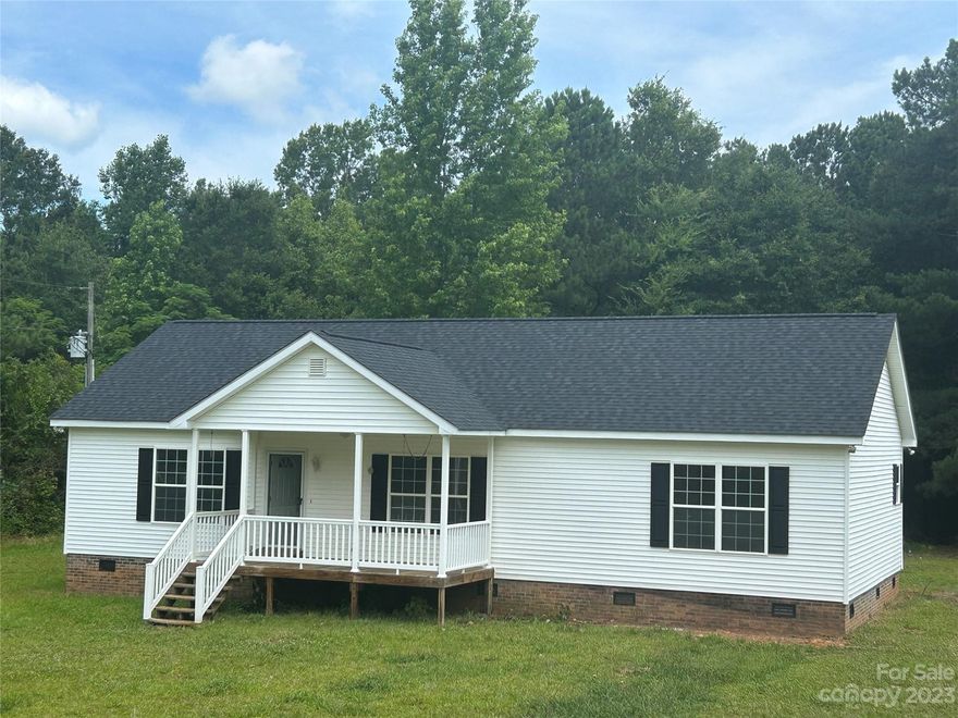 Come see this ideal country setting surrounded by large acreage properties.  Newly renovated 3 bed 2 bath split floorplan modular home.  House sits perfectly on +/- 2.5 acre lot that is about half wooded and half open. Roof approximately two years old. Nice size pecan tree in the front yard is the perfect shady spot to enjoy a warm summer evening.  Mobile home located directly next door is not included.