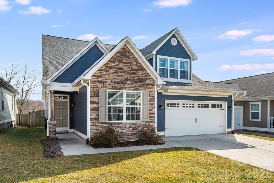 Built in 2019, this beautifully maintained 4-bedroom, 3-bath home offers 2,377 square feet of thoughtfully designed living space in desirable Arden. Conveniently located just 3 miles from Asheville Regional Airport and minutes to shopping, dining, and outdoor recreation in Asheville, this home blends modern convenience with the charm of Western North Carolina living.

Step inside to a bright, open-concept layout filled with natural light and contemporary finishes. The spacious living area flows effortlessly into the kitchen and dining spaces, creating the perfect setting for entertaining or everyday comfort. The kitchen features ample cabinetry, generous counter space, and modern appliances designed for both style and function.

The primary suite offers a peaceful retreat with a private bath and spacious closet. Three additional bedrooms and two full bathrooms provide flexibility for guests, a home office, or multi-generational living.

A two-car garage adds convenience and extra storage, while the outdoor space offers room to relax, garden, or entertain. Move-in ready and ideally located for commuters and travelers alike, this home delivers comfort, style, and accessibility in one of Arden’s most sought-after areas.

Schedule your showing TODAY!