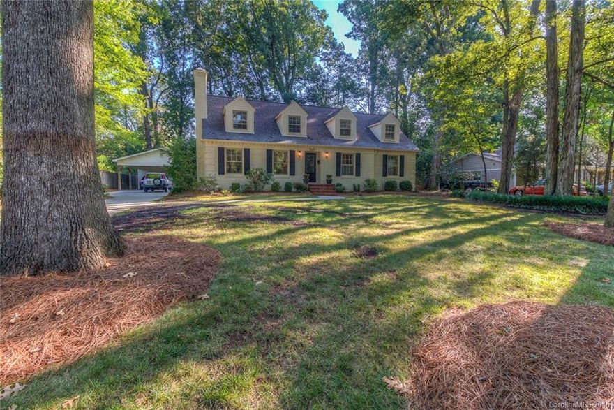 Rare Sherwood Forest 2-story on Myers Park side w/ 1st floor owner's suite. Great layout w/ private home office & a large living room that flows to dining and sunroom. Kitchen has new granite, updated backsplash & stainless appliances, including 5 burner gas range w/ electric oven. 2 beds down, 2 more spacious bedrooms up. Newly refinished hardwoods, new paint, new roof and new 1st floor heat. Great storage inside & even more outside attached to newer, oversized 2-car carport. Welcome home!