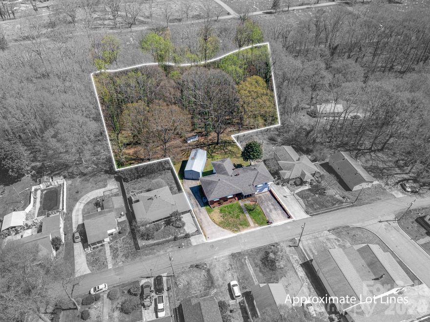 Charming 1950s brick ranch with endless potential in the heart of Lincolnton! This well-built home offers over 2,400 sq ft on the main level, providing an incredible opportunity to reimagine and customize the space to fit your needs. While currently configured as a 2-bedroom, 1.5-bath home, the generous layout offers ample room for expansion, reconfiguration, or a complete modern transformation. This house has been owned and loved by the same owners since the 1960s and it shows. Inside, you’ll find spacious living areas ready for your personal touch, with solid construction and a layout that lends itself well to remodeling. Whether you’re looking to create additional bedrooms, open up the floor plan, or design your dream kitchen and primary suite, the possibilities here are truly endless. The home also features a full unfinished basement—perfect for storage, a workshop, and all of your Pinterest board ideas! This home also has an attached basement load two-car garage. Outside, you’ll love the large metal RV garage, ideal for storing recreational vehicles, equipment, or creating the ultimate hobby space. Situated on a hard-to-find 1.6+/- acre lot, this property offers space to spread out, and room for additional improvements—all while being conveniently located in Lincolnton. A rare opportunity to own a solid home with a large lot and unlimited potential!