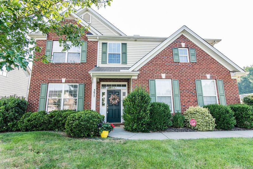 HUGE corner lot with side load garage! Granite counters, kitchen island, custom backsplash, new flooring on main, functional layout, stainless steel appliances, gas log fireplace, wainscoting in dining room, granite counters in bathrooms, spacious bedrooms, vaulted ceiling in master bedroom, fenced backyard.