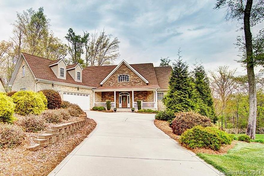 Luxurious 4BR/3.5BA home with 1st-floor master suite, 3-car side-load garage, 2-story great room, granite and work island in gourmet kitchen, enormous bonus room, beautifully finished basement with second living space. Entertain outdoors on the balcony, patio and screened back porch. Security system and new paint throughout. City water, fenced and lushly landscaped yard with irrigation from well, storage building. Home warranty!