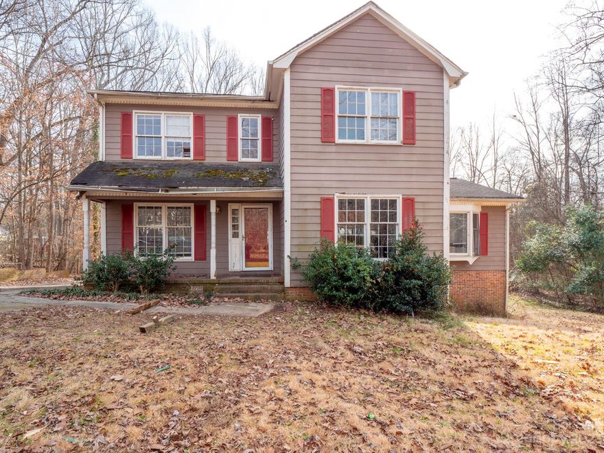 Come explore this unique opportunity in Rock Hill. Large home on a beautiful lot in a great neighborhood. Home features a huge great room with fireplace. Large eat in kitchen that leads to the screened porch and huge deck where you can enjoy the beautiful wooded backyard. The home also a basement for additional space for entertaining or for accommodating guests. The home needs some TLC, but with the right vision, this could be a true gem. Easy access to commuter routes and a short drive to downtown rock hill  Don't miss this house!