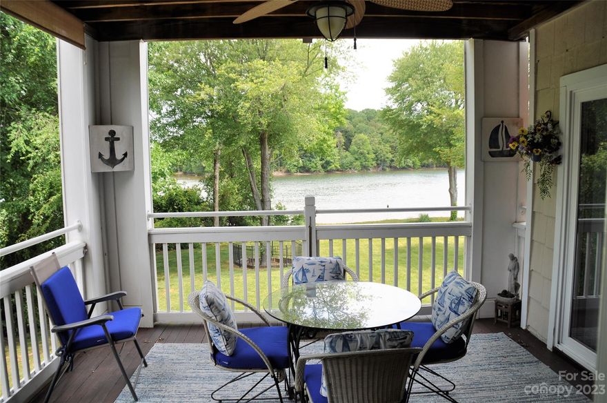 Beautiful waterfront condo located at Spinnaker Point.  This three bedroom unit is a very rare lakefront end unit.  Second floor corner unit in an elevator building. This is a turn-key second home.  Don't miss these amazing lake views from your large covered porch, living room and primary bedroom.  Home offers a cozy gas log fireplace, updated flooring, fresh paint, new Pella sliding doors and windows, updated appliances, updated fans and light fixtures, granite countertops in kitchen, marble tops in the bathrooms, lots of storage space, built-in shelving in the great room, pantry, etc.  Closets have built-in shelving and hanging rods.  Just steps to the swimming pool, Kayak launch and storage area.  Interior fire sprinkler system.  Enjoy this amazing location.  Located near restaurants, grocery store, convenience/gas station, Downtown Davidson, Davidson College, I-77, Davidson Nature Preserve, MSC Park and much more.  Furniture optional.  Come take a look today!