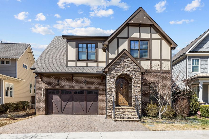 Premier house built by Grandfather Homes in 2016 located in a quiet pet/child friendly cul-de-sac. A Tudor-style arcade foyer leads to an inviting open floor plan, 10ft coffered ceilings & stunning stone fireplace. House features high-end upgraded finishes with custom kitchen and bathrooms, Lutron lighting controls and built-in interior & outdoor sound system. First floor primary bedroom has a built-out seating area, vaulted beamed ceiling, striking chandelier, walk-in closet, bathroom with dual vanities, granite counter tops, custom steam shower & large jetted tub. Gorgeous exterior with in-ground irrigation, screened porch, paver patio, and gated fence. Upstairs has 3 bedrooms, 2 baths, bonus room, and walk-in attics. Attached 2-car garage has large storage area. Located in Myers Park school district, walking distance to Freedom Park, Dilworth, South End, Park Road Shopping Center and major hospitals, this home is located close to some of the most desired destinations in Charlotte.